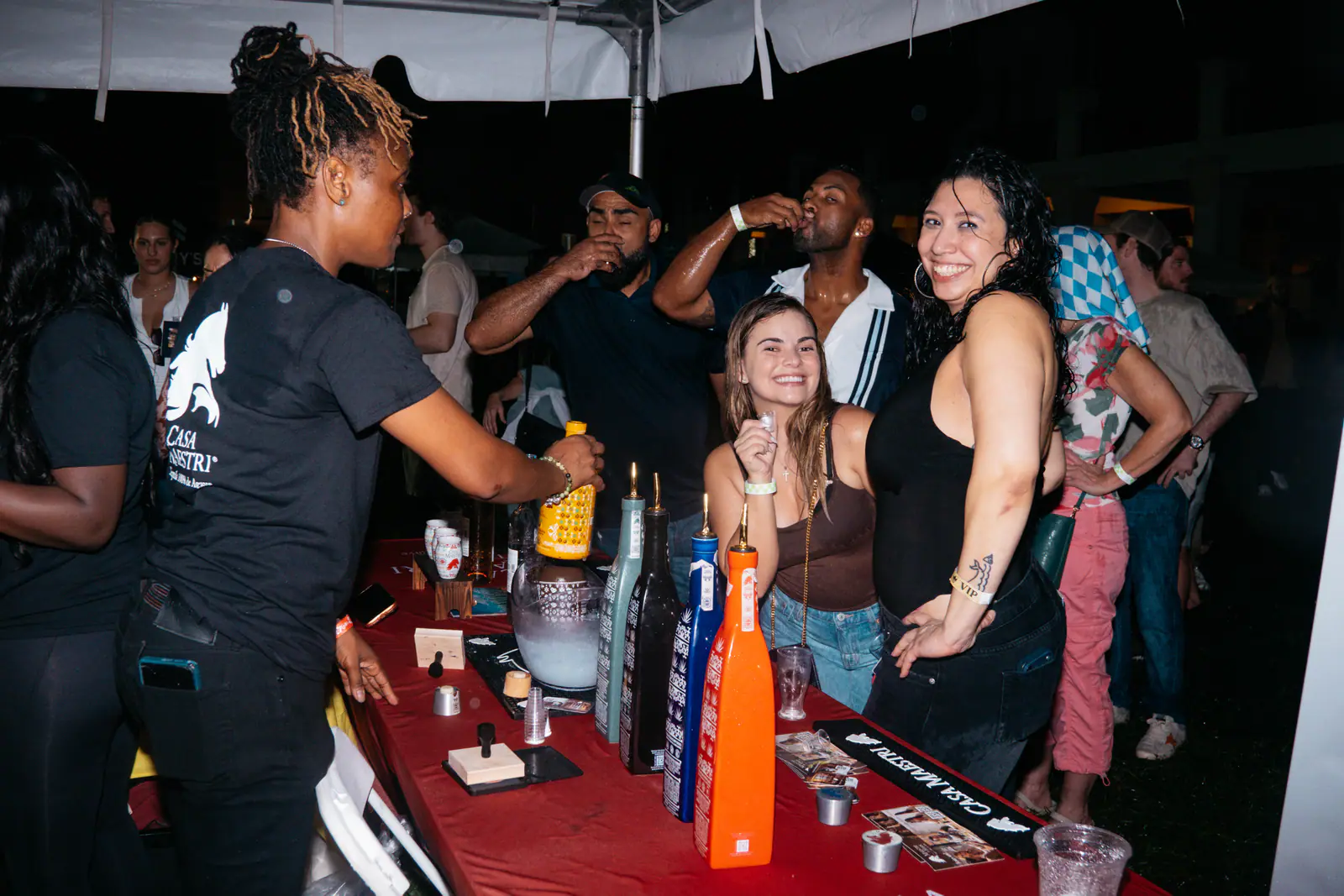 Guests sampling pours at a tasting table