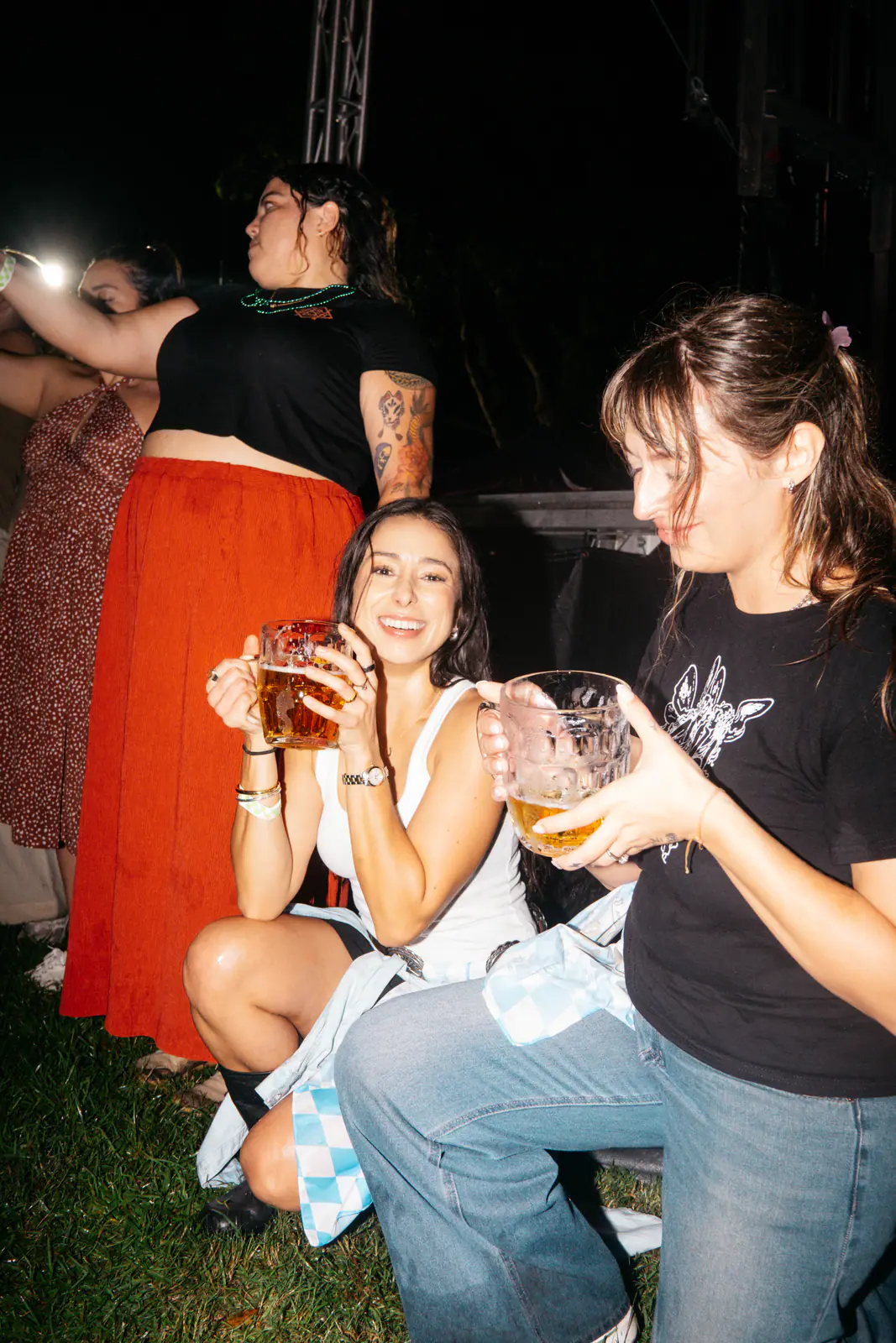 Friends laughing with beer steins